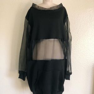 Black sheer and sold sweatshirt dress.